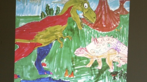 Les dinosaures à la bibliothèque avec le raconte-tapis et le dessin animé.